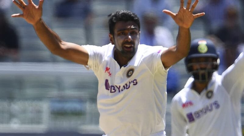 R Ashwin holds