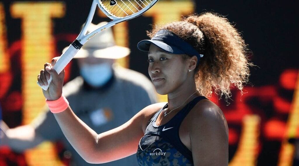 Naomi Osaka reaches