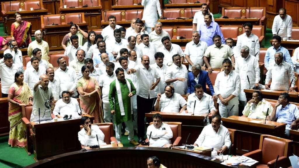 Congress MLAs shout slogans