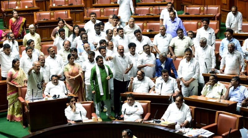 Congress MLAs shout slogans